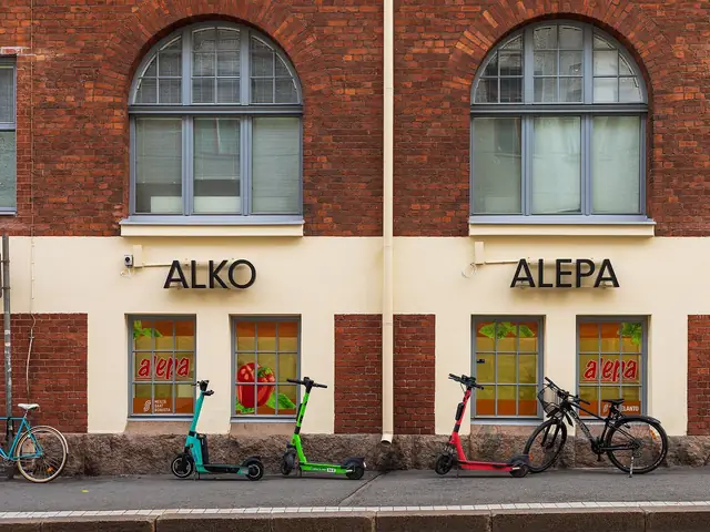 An Alko shop front in Katajanokka, Helsinki, with the ALKO sign on the red-brick facade (the venue row stands for the chain)