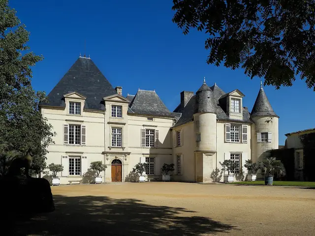 Château Haut-Brion's turreted 16th-century house in sharp sunlight