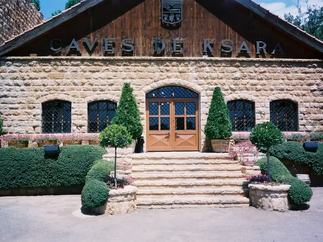 The stone front of Château Ksara's headquarters in the Bekaa, CAVES DE KSARA carved above the door