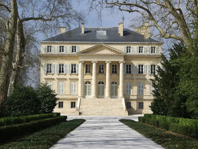 Château Margaux's neoclassical colonnaded façade at the end of its gravel drive