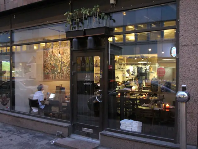 Restaurant Grön's street front on Albertinkatu, the glass facade with the dining room behind it