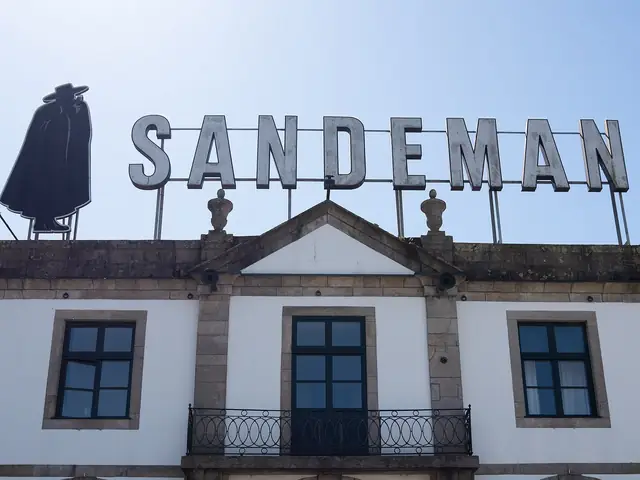 The SANDEMAN sign and silhouette on the roof of the Sandeman lodge in Vila Nova de Gaia