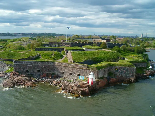 Suomenlinna sea fortress from the air: grassy bastions, granite walls and the small lighthouse