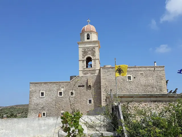 Toplou Monastery's 33-metre bell tower above its fortified stone walls, eastern Crete