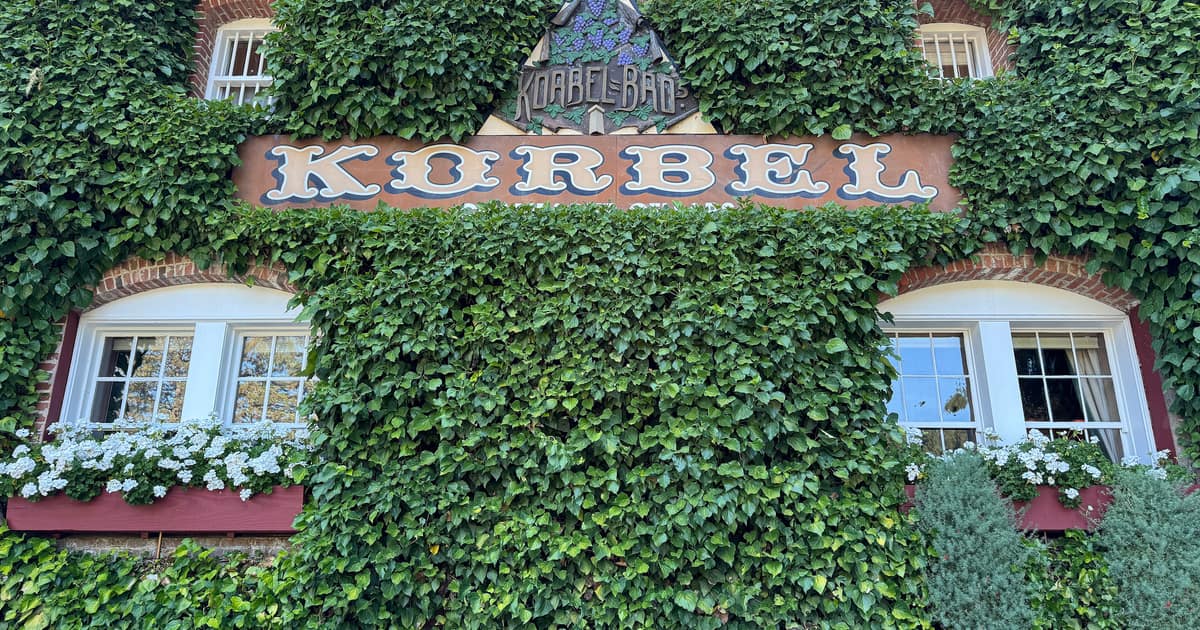 The ivy-covered Korbel Champagne Cellars building with its KORBEL sign, Sonoma County